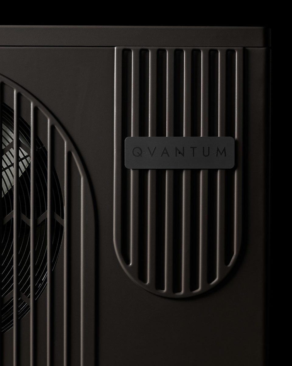 Close-up of the Qvantum QA's arched fan grille and its rounded side grille, against black
